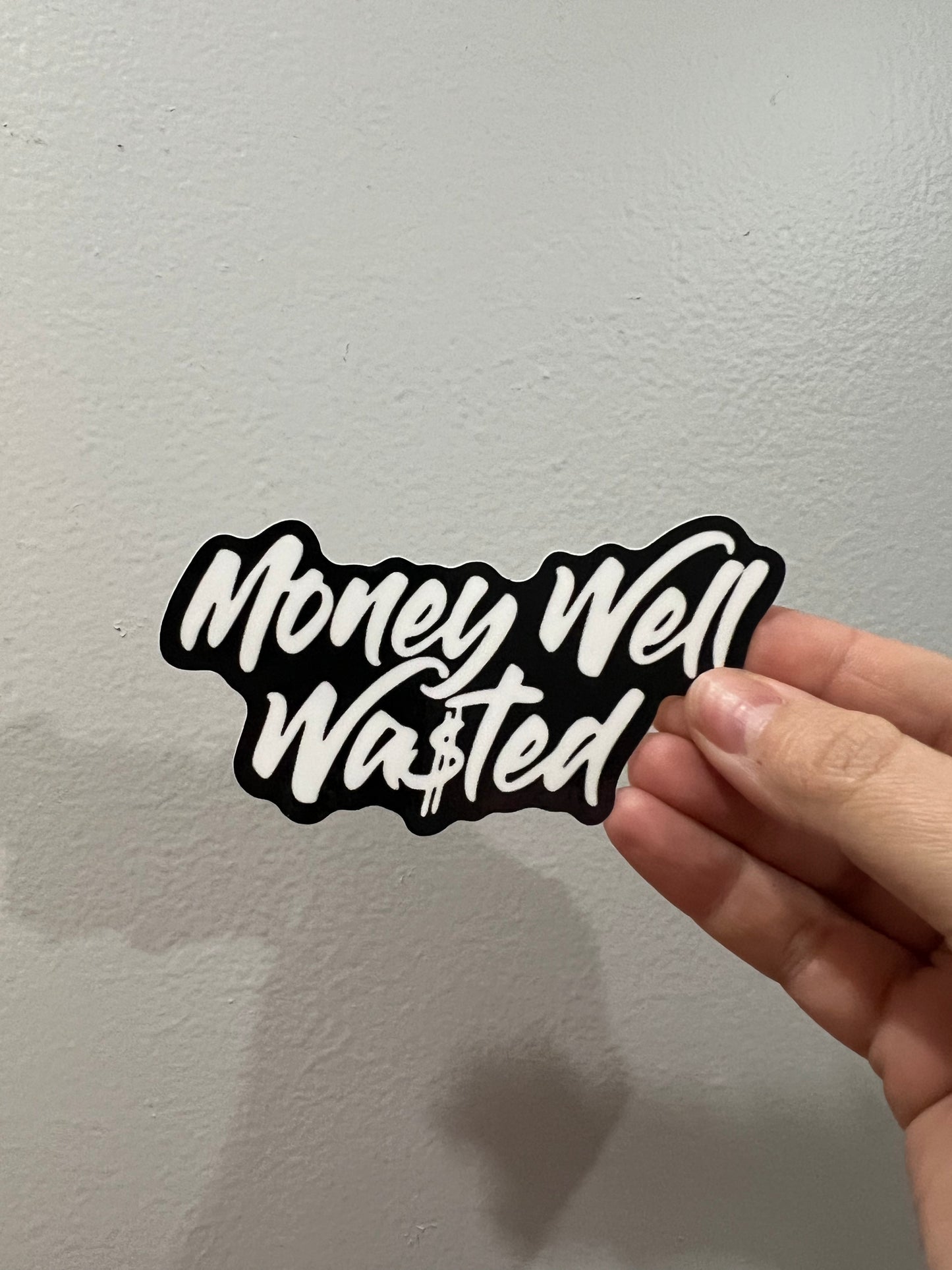 MONEY WELL WASTED STICKER